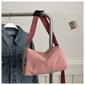 Detailed texture of pink corduroy tote bag with fashion label on denim jacket - Pink (No Charm)