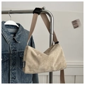 Detail of corduroy texture and fashion woven label on a beige crossbody tote bag - Khaki (Without Charm)