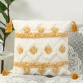 Housse de coussin bohème blanc cassé avec motifs touffetés jaunes et glands - Coussin avec Garnissage
