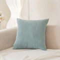 Light blue corduroy pillow cover with wide striped texture on a beige sofa - Crystal Blue