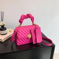 Magenta quilted crossbody bag with heart buckle and gathered handle including a mini pouch - Rose Red