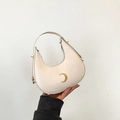 Bolso hobo de cuero blanco crema estilo francés con logo de media luna dorada de mujer - Blanco Roto