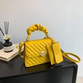 Yellow quilted handbag set with heart-shaped metal clasp and matching small pouch - Yellow
