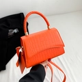 Bright orange crocodile embossed leather handbag with woven handle and matching mini pouch - Orange