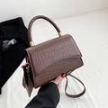 Brown crocodile embossed leather handbag with woven handle and small matching pouch - Brown