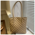 Close-up of quilted pattern detail on the warm khaki faux leather tote bag - Khaki