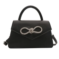 Elegante zwarte kunstlederen crossbodytas met een sprankelende strikgesp van strassteentjes - Zwart