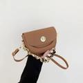 Brown saddle crossbody bag with golden twist lock and silk scarf chain strap detail - Brown