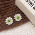 Macro detail of handmade daisy earrings with white pearls and green chalcedony center - Green (A-1109-Green)