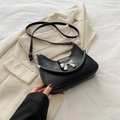 Borsa a mano nera chic con fiocco metallico argento in pregiata pelle sintetica - Nero