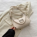 Elegante borsa a tracolla a mezzaluna bianco crema con fiocco argento e tracolla regolabile - Bianco