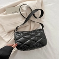 Chic black quilted puffer crossbody bag with adjustable wide strap and glossy finish - Black