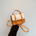 Contrast color structured handbag in orange and cream white with gold hardware - Orange