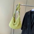 Light green popcorn textured shoulder bag with pleated details on a metal hanger - Yellow