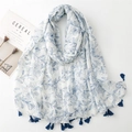 Linen feel cotton scarf featuring blue lily flower patterns and tassel edges for women - Blue