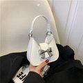 White leather shoulder bag with silver bow buckle and chain strap for women - White