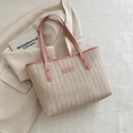 Borsa tote in paglia beige con manici in pelle rosa e motivo a spina di pesce chic - Rosa