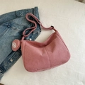 Pink corduroy dumpling shoulder bag with adjustable strap and matching coin purse - Pink