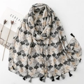 Linen-touch shawl scarf with black and beige scallop pattern and tassel detail - Black