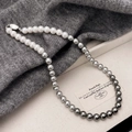 Elegant gradient pearl necklace featuring white to dark grey transitions with metal clasp - Gradient Triple Color Pearl