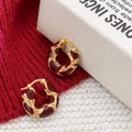 Irregular gold hoop earrings with deep red enamel and sparkling zircons in a warm setting - Ancora Red Enamel