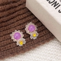 Handmade flower stud earrings featuring purple crystals and white floral accents - Purple