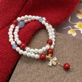 Vintage pearl beaded double-layer bracelet with red beads and crystal bee charm - Bee Chinese Style Pearl Bracelet
