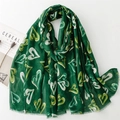 Detailed close-up of dark green scarf with gold foil hearts and frayed edges - 180*88cm / Dark Green