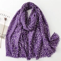 Detail of deep purple scarf featuring golden leaf prints and fringed edges on white - Purple (SL2311-006)