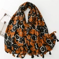 Floral cotton linen scarf with black orange patterns and tassels for autumn winter fashion - Black Coffee
