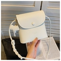 Detail of white mini crossbody bag with elephant charm and braided shoulder strap - Off White