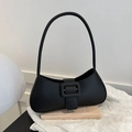 Minimalist black baguette bag with oversized matte buckle and sleek shoulder strap - Black