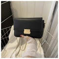 Minimalist black faux leather shoulder bag with gold chain strap and metal buckle - Black