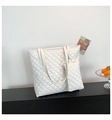 White quilted tote bag set with matching small pouch featuring a classic diamond pattern - White