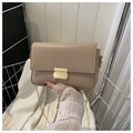 Minimalist beige crossbody bag with gold rectangular lock and metal chain strap - Khaki