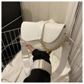 Detail of white saddle bag with golden chain and adjustable wide woven strap - White