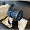 Deep blue quilted denim baguette bag with black leather straps and gold metal plaque - Dark Blue