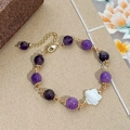 Handmade gold plated bracelet with purple natural stones and a white rose shell flower - Purple Natural Stone Handmade Woven Rose Style