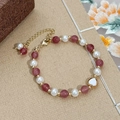 Bracciale di cristallo rosa e perle con ciondolo a cuore dorato su sfondo strutturato - Placcato Oro Vero - Bracciale con Perline Fatto a Mano