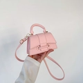Mini soft pink leather handbag with pebble texture and adjustable shoulder strap - Pink