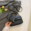 Black leather small square bag with top handle, crossbody strap and fashion charm - Black