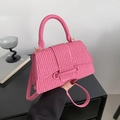 Pink woven texture crossbody bag with cylindrical top handle and golden metal buckles - Pink