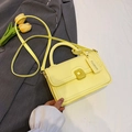Chic yellow leather crossbody square bag with top handle and fashion tag detail - Yellow