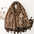 Elegant leopard print scarf with gold foil accents and fringe on a minimalist background - Black Leopard (SL2307-014 Black)