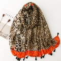 Fashionable leopard print scarf with gold foil accents, orange border and black tassels - Orange Leopard (SL2307-014 Orange)