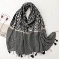 Elegant cotton-linen scarf with geometric floral patterns and long fringe tassels - Black