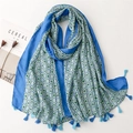 Bohemian floral print scarf with bright blue border and tassels on white background - Blue