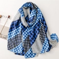 Blue and white polka dot scarf with a soft fringed edge laid flat in a minimalist setting - 180*85CM / Blue (SL2304-019 Blue)