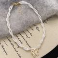 Elegant double-layer pearl necklace featuring a gold butterfly pendant with zircon crystals - Gold White Pearl (Standard)