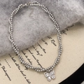 Double-layer grey pearl necklace with a sparkling butterfly zircon pendant in gold - Silver Grey Pearl (Standard)